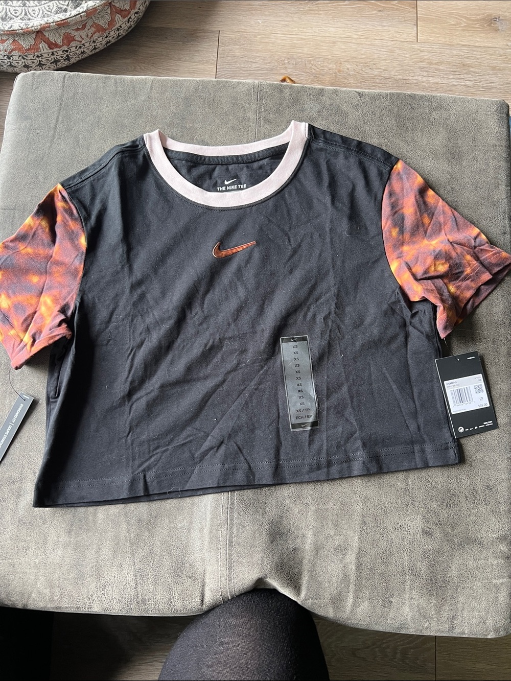 NWT. WMNS. Limited edition Nike Black Cropped Tee with tortoise Tie-Dye Sleeves